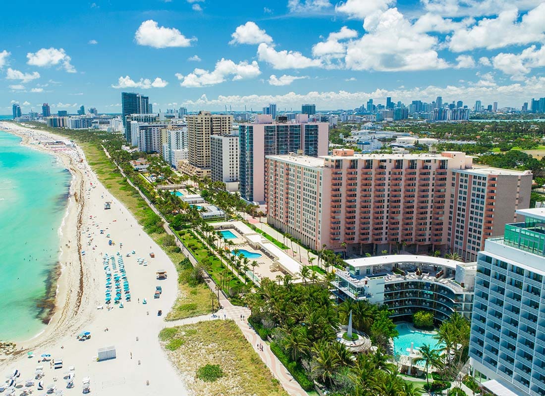 Miami Beach, FL - Aerial View of Hotels and Buildings by the Beach in Miami Beach Florida on a Beautiful Day